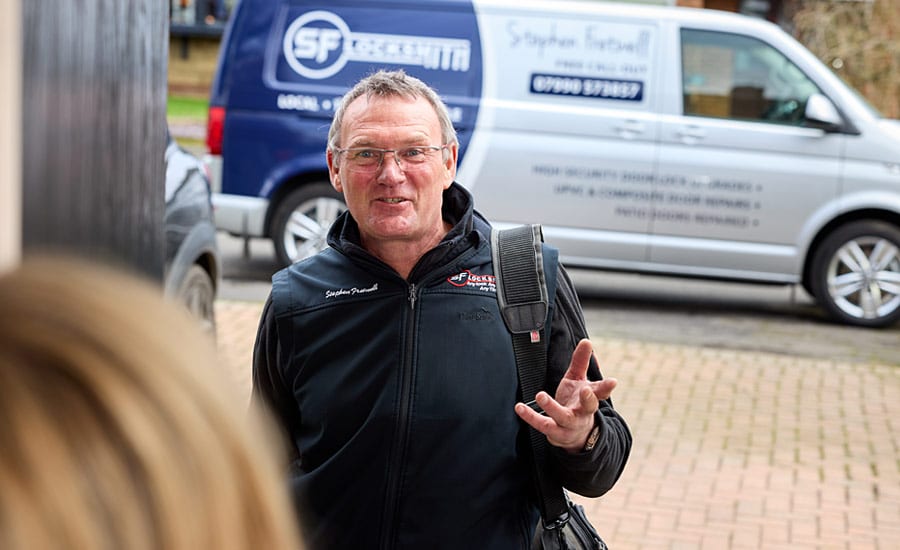 Local locksmith repairing patio doors